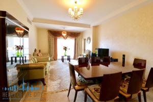 Dining area at Holiday apartment in Fairmont the Palm Residence