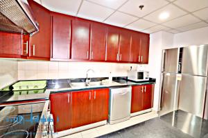Kitchen in Apartment for short stay in Shams JBR Dubai