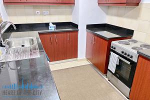 Kitchen in apartment for short stay at Rimal JBR Dubai