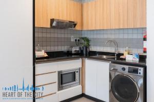 Kitchen in Hotel apartment in Metro Central in Barsha Heights Dubai